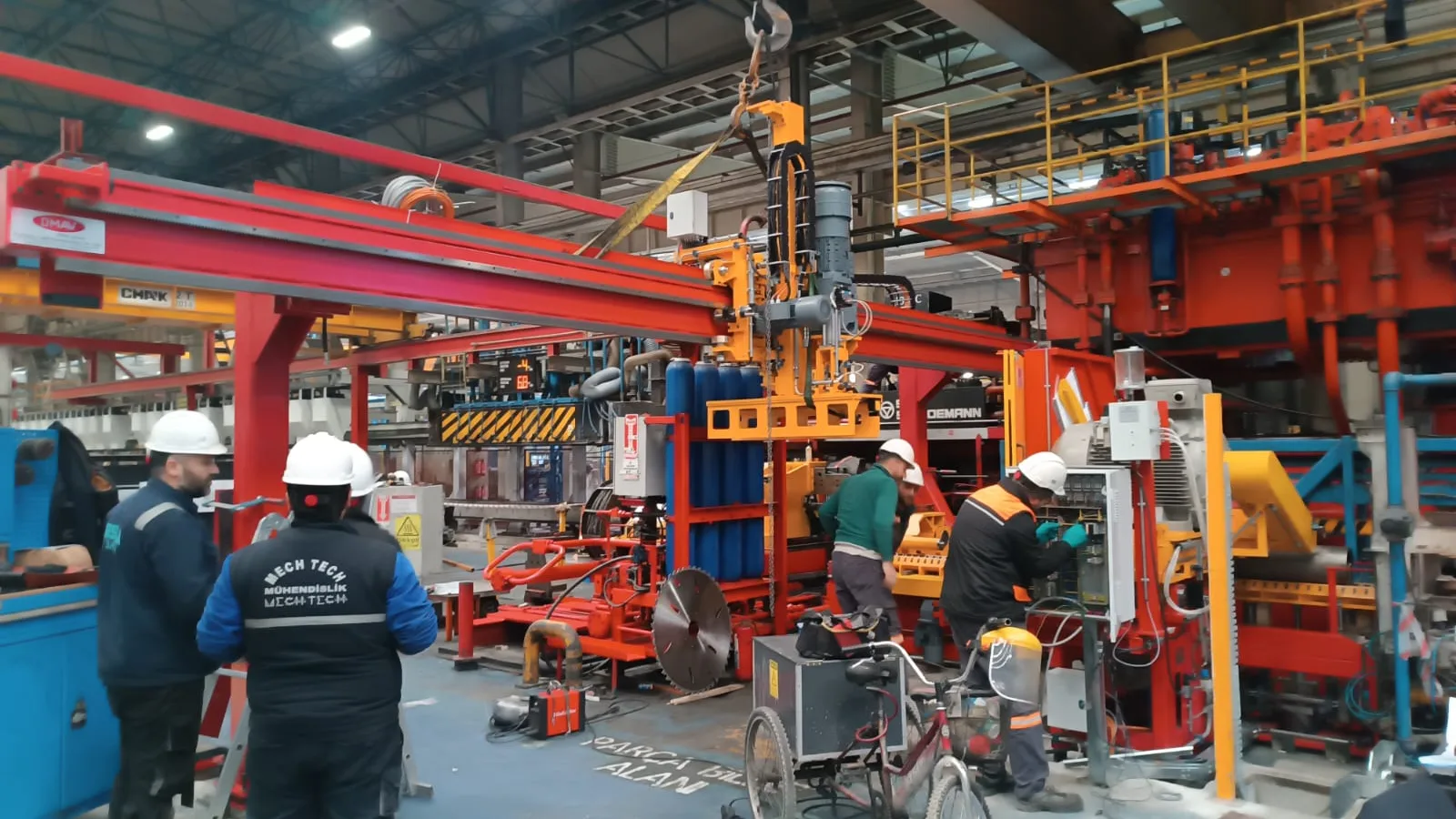 Mech-Tech crew working on the 40 MN press revision