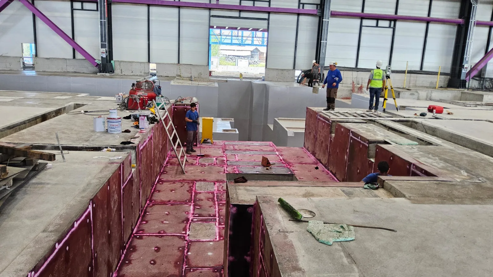 Anchor template set in a machine foundation pit