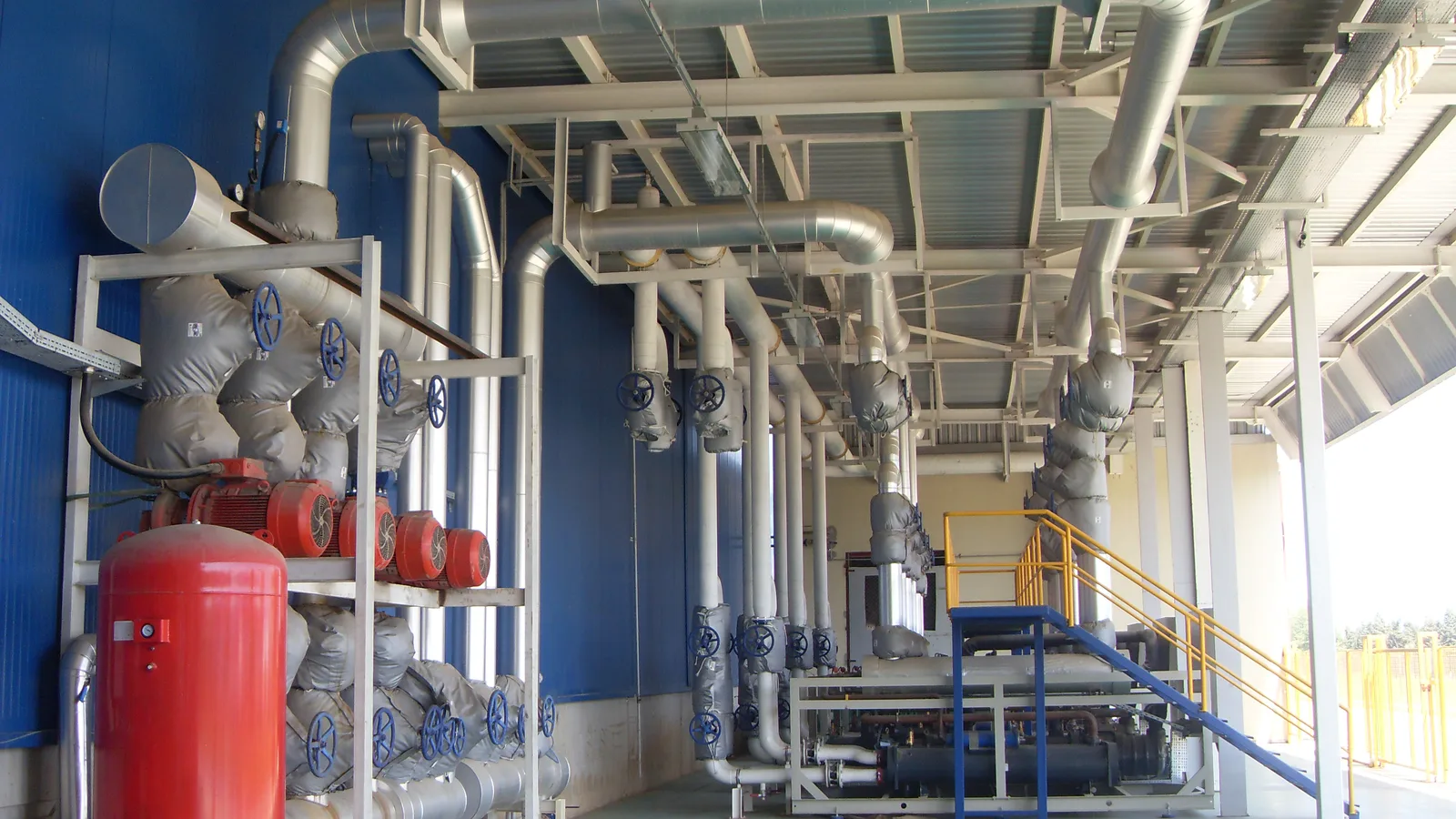 Chiller cooling water line with insulation and cladding