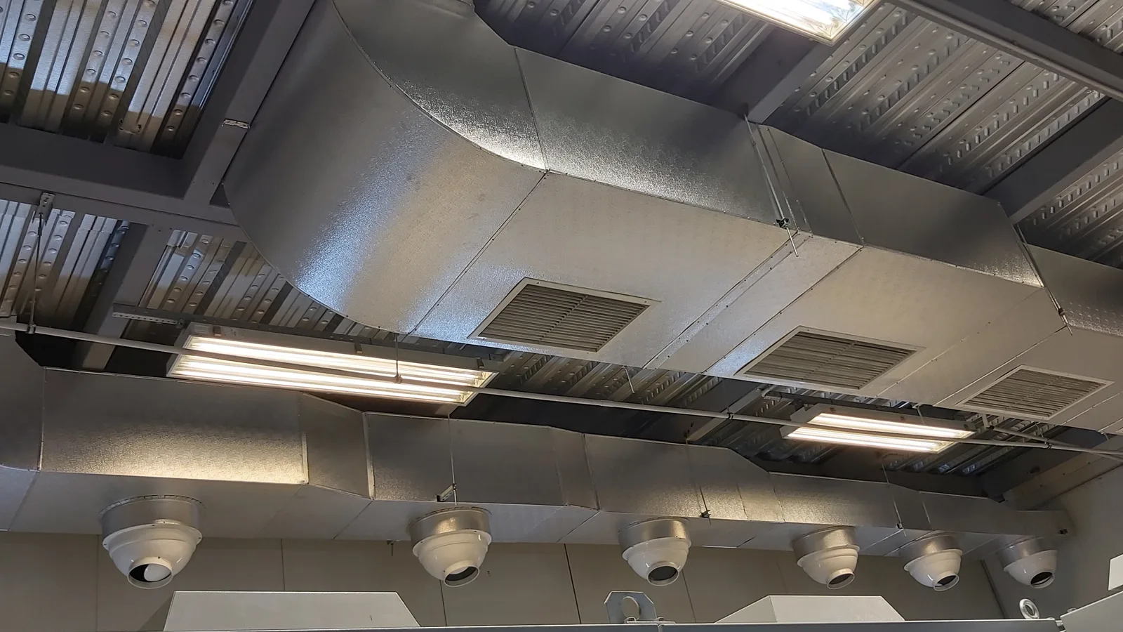 Ventilation ductwork installed at roof level